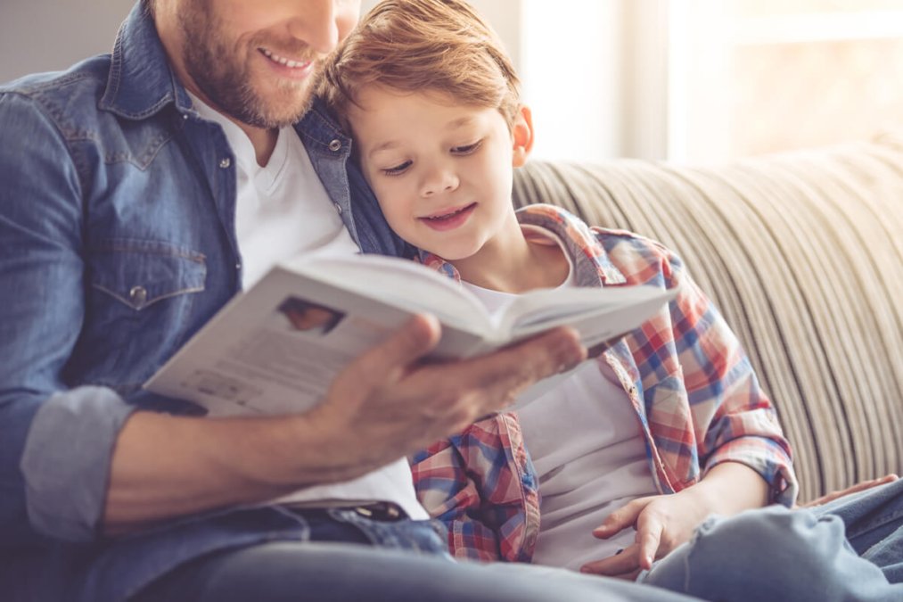 Father reading to his child